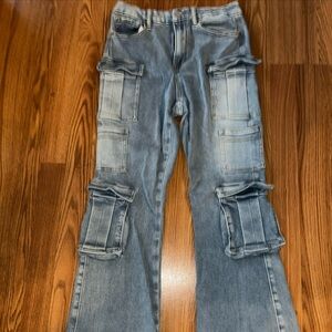 Insane Gene size 9 stretchy jeans. 5 front cargo pockets. Flares. 31 inch inseam